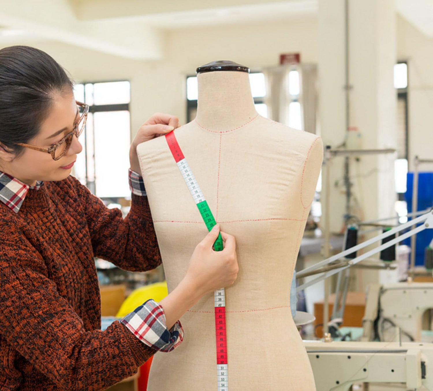 LILLY PILLY technician measuring up for garment design